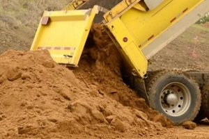 machine-unloading-fill-dirt
